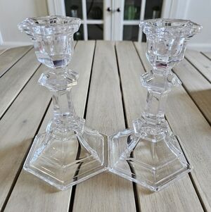 Set of two clear crystal or glass candlestick holders. (USED)